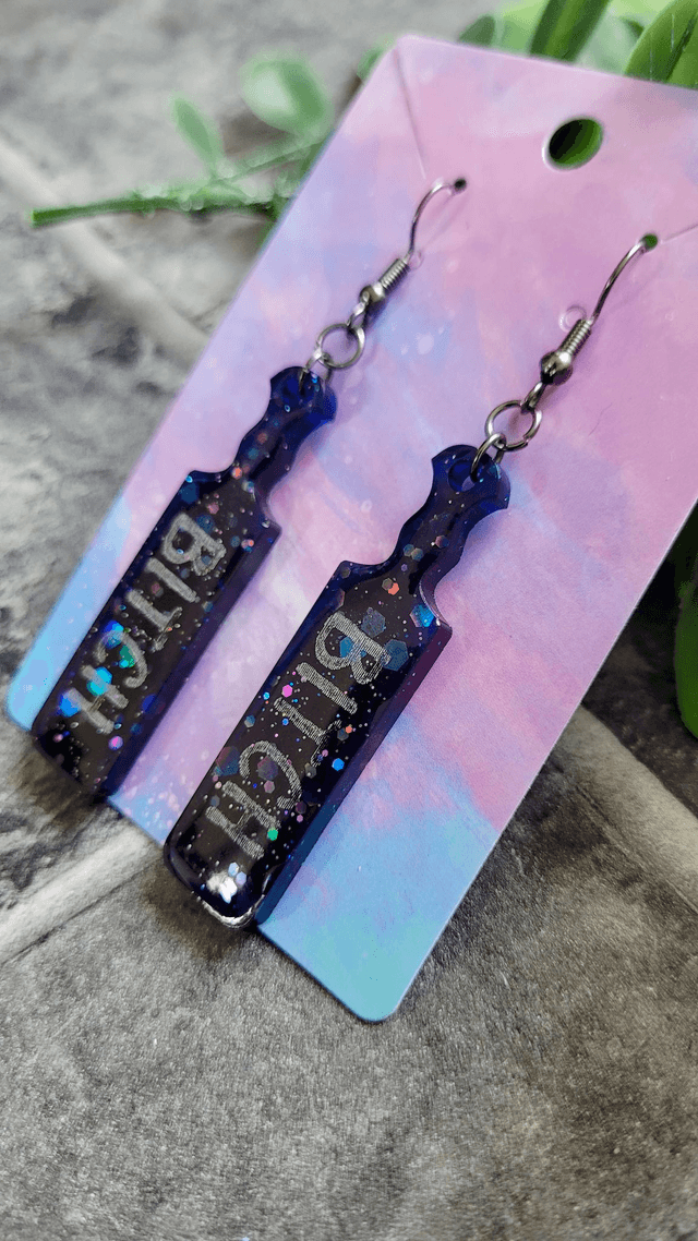 Earrings | Blue-Black Holographic Glitter BITCH earrings  | Stainless Steel Gunmetal Black Hooks