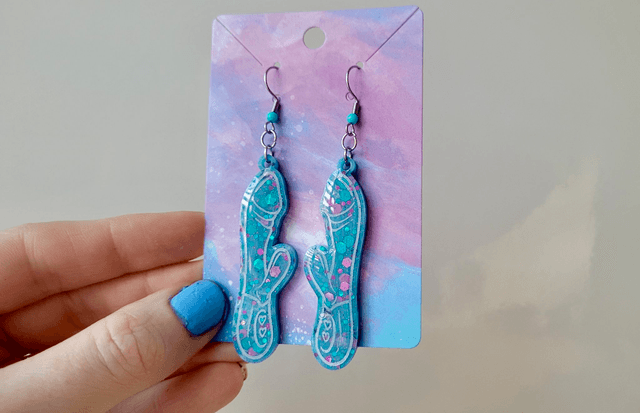 Earrings | Blue & Purple Glitter with White Outline Rabbit Vibrator Earrings | Stainless Steel Hooks & Colour Bead