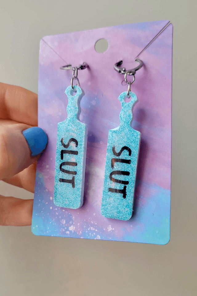 Earrings | SLUT Paddle Earrings Light Blue Glitter on White Base | Stainless Steel Hoops