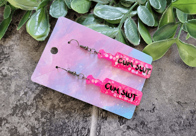 Earrings | CUM SLUT Bright Pink Glitter Paddle Earrings | Stainless Steel Gunmetal Black Hooks