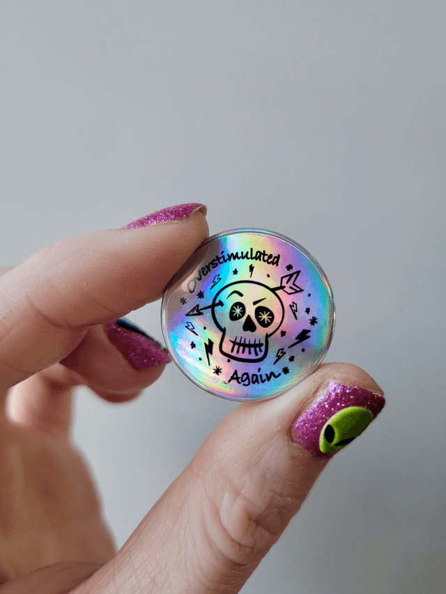 Holographic Overstimulated Again Skull Badge