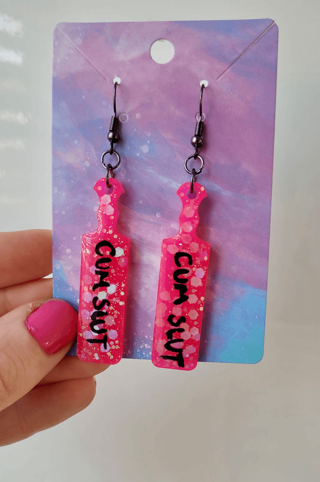 Earrings | CUM SLUT Bright Pink Glitter Paddle Earrings | Stainless Steel Gunmetal Black Hooks