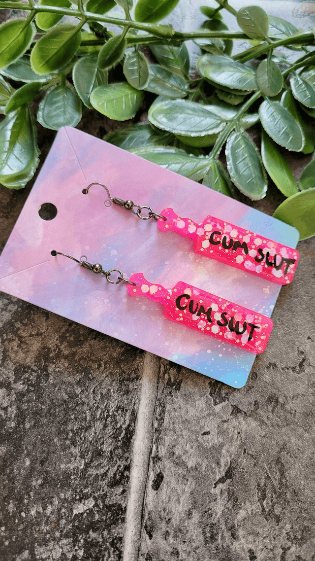 Earrings | CUM SLUT Bright Pink Glitter Paddle Earrings | Stainless Steel Gunmetal Black Hooks