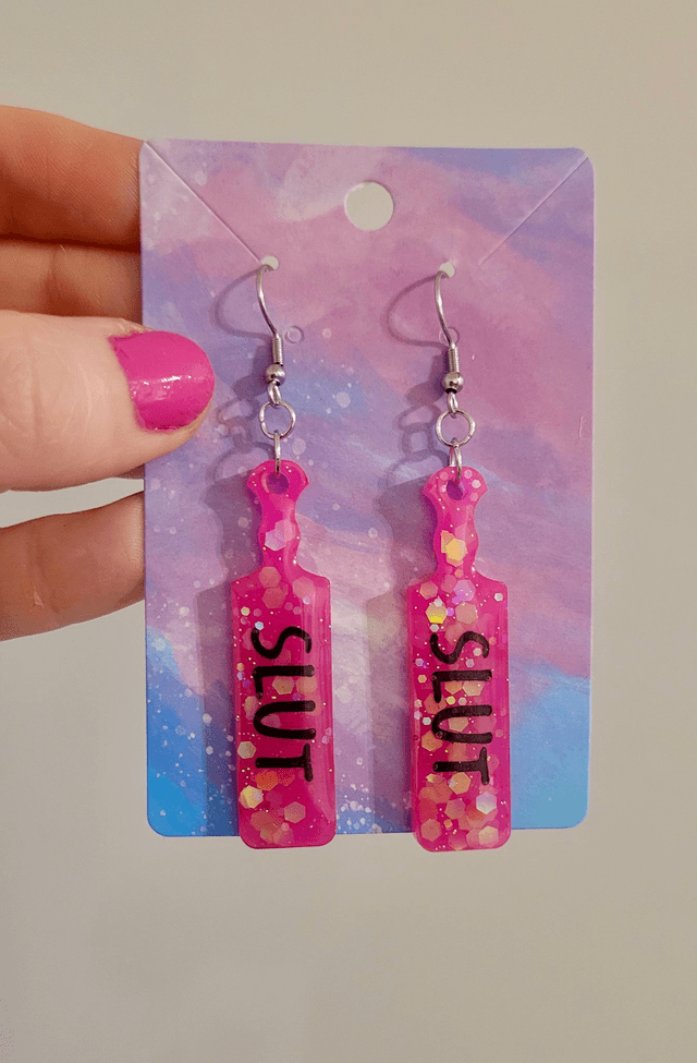 Earrings | Bright Pink Glitter SLUT Paddle Earrings | Stainless Steel Hooks